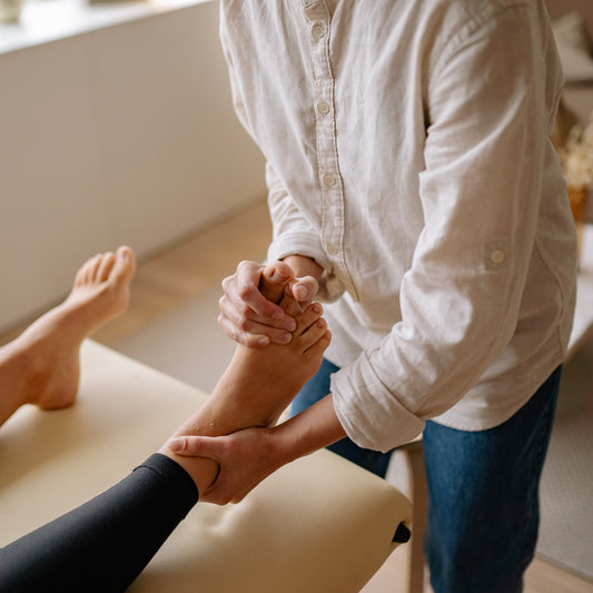 how to massage sprained ankle