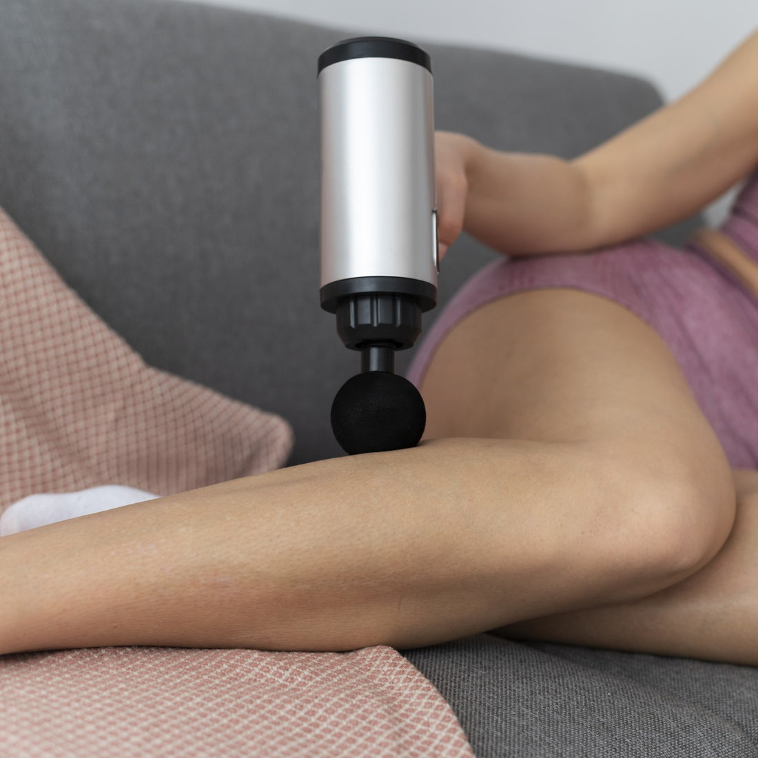 how to use massage gun on sore legs